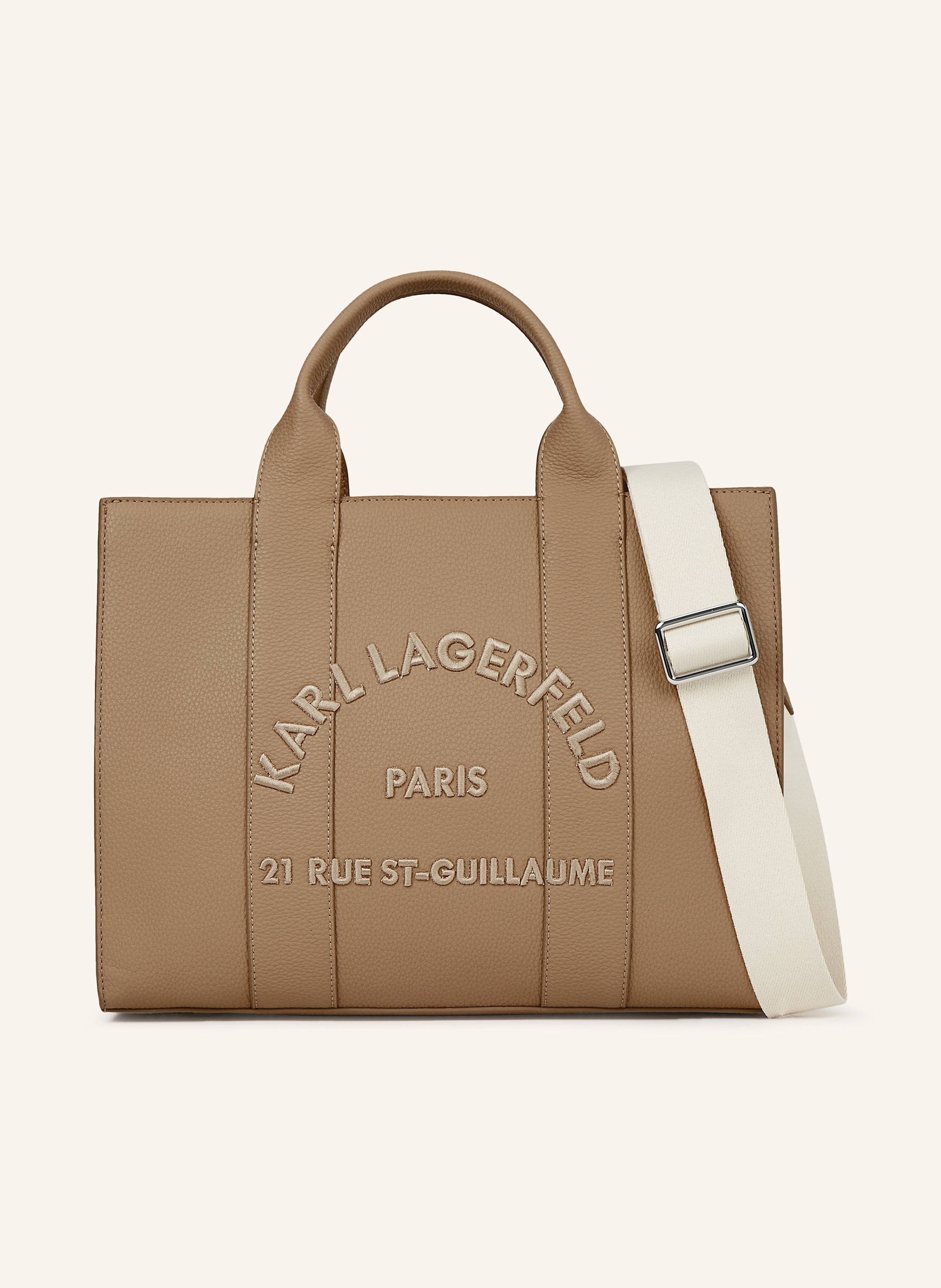 Karl Lagerfeld Diese vielseitige Tote Bag vereint mühelose Eleganz und praktische Funktionalität – das perfekte Accessoire für jeden Tag. Der verstellbare Riemen ermöglicht ein individuelles Styling, während ihr die in braun