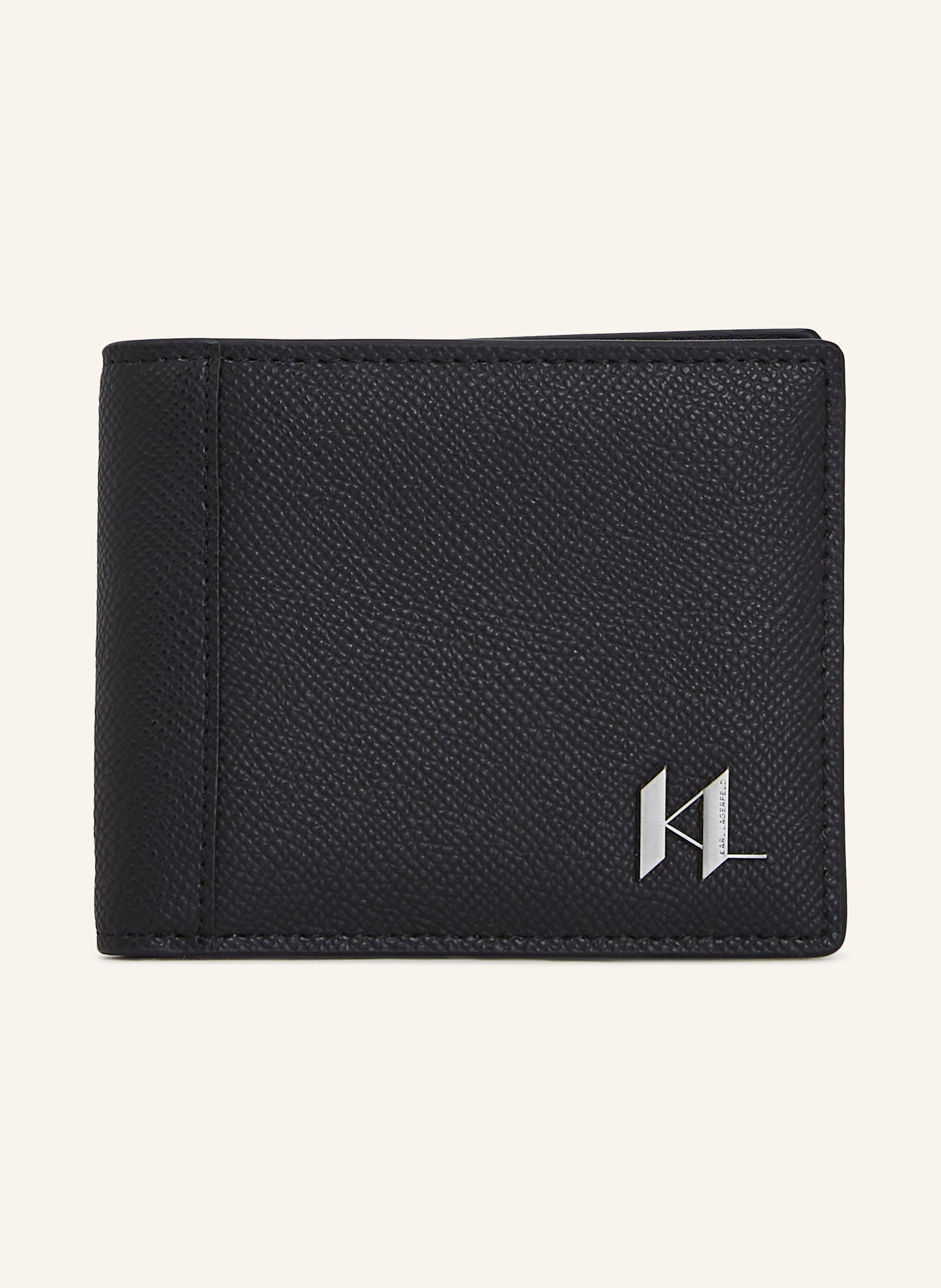 Karl Lagerfeld Diese Brieftasche aus Leder ist mit ihrem Klappdesign perfekt für die tägliche Organisation. Sie verfügt über eine Innentasche für Münzen und über mehrere Kartenschlitze. Verziert mit einem kontrastie in schwarz