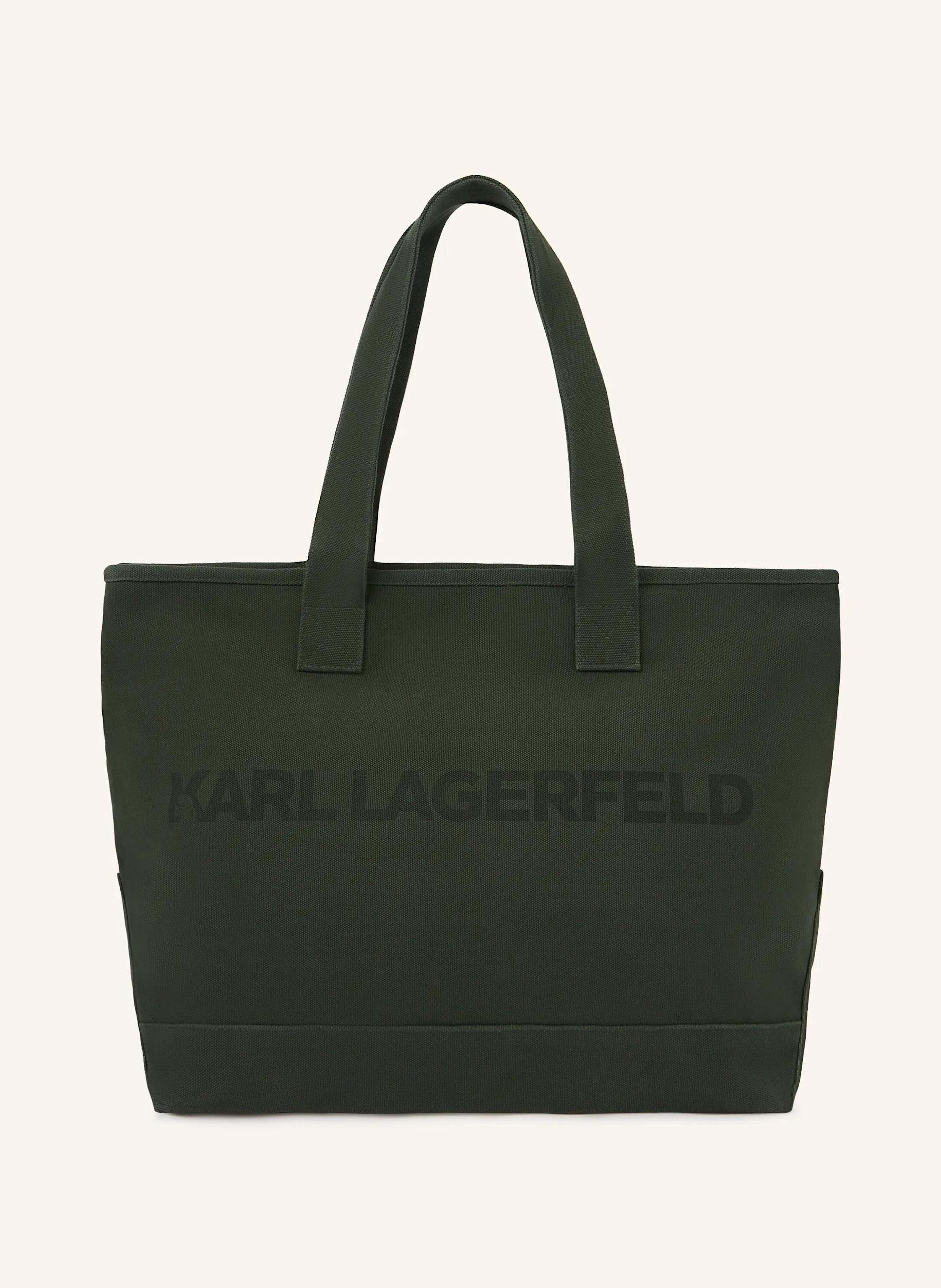 Karl Lagerfeld Eine großzügige Tote-Bag mit einem Body aus gewebter recycelter Baumwolle, die mühelos Platz für alles bietet. Der sichere Reißverschluss und die Innentasche halten wichtige Dinge sicher verstaut – id in dunkelgrün