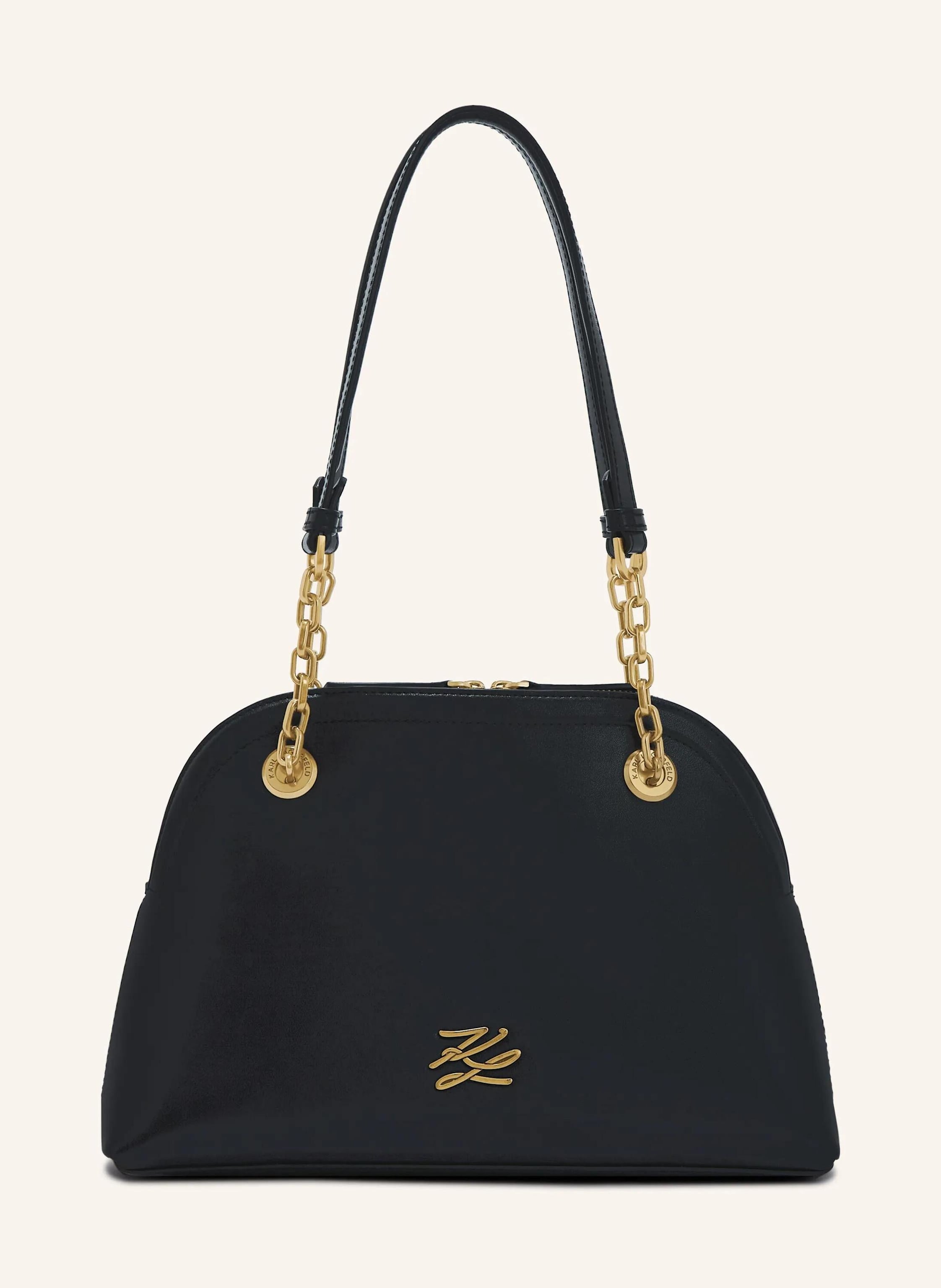 Karl Lagerfeld A contemporary shoulder bag with a refined bowling silhouette. Soft leather meets chic chain straps, accented by the elegant Karl Autograph logo. Perfect for day-to-night elegance. Contemporary bowlin in schwarz/ gold