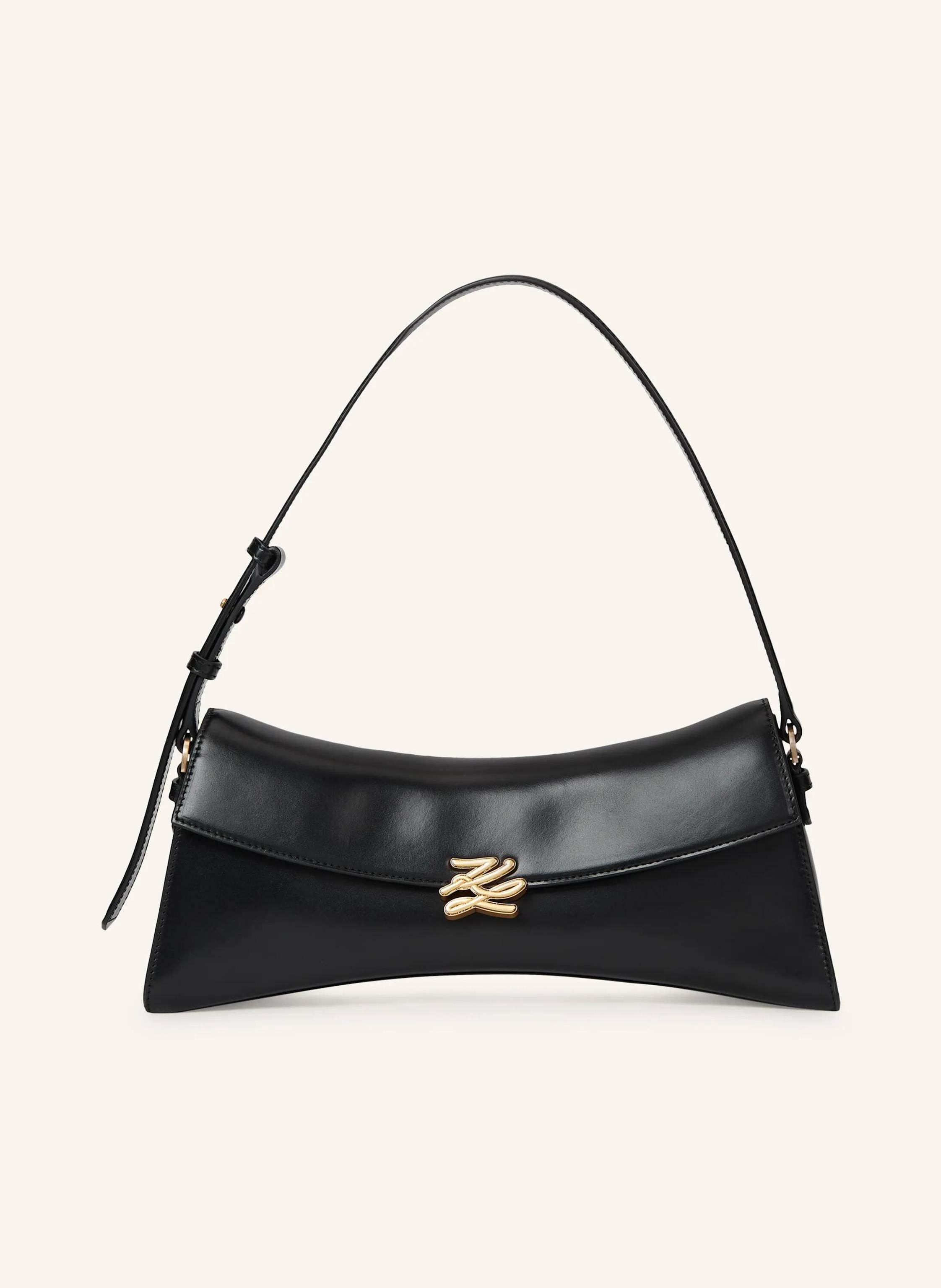 Karl Lagerfeld Diese architektonisch anmutende Schultertasche ist eine Hommage an Karl Lagerfelds legendäre Ballett- und Opernkostüme und besticht durch ihre Dramatik. Mit der eleganten Karl Autograph-Signature verz in schwarz/ gold