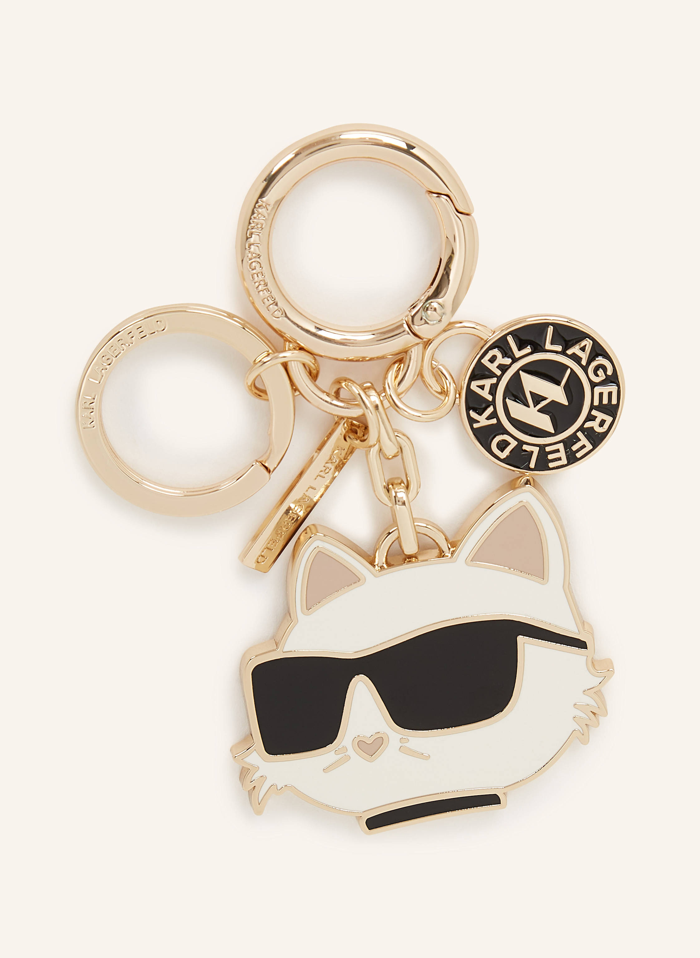 Karl Lagerfeld Verleihen Sie Ihren Accessoires einen Hauch von verspielter Eleganz mit diesem Schlüsselanhänger aus Metall. Er überzeugt besonders durch die charmanten IKON Choupette- und KARL-Monogramm-Anhänger. Di in gold