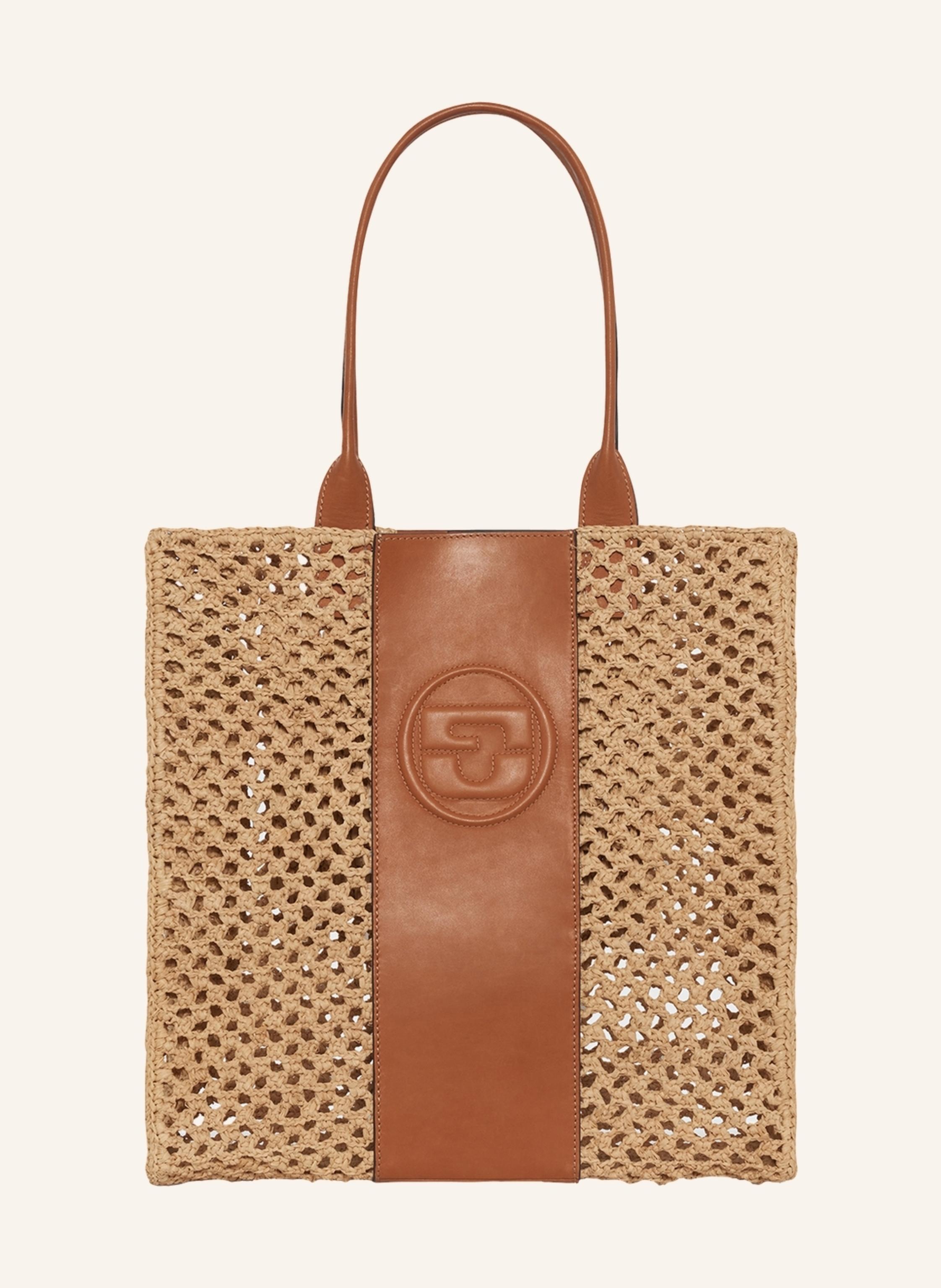 Gerard Darel Die ANDIE ist eine Neuinterpretation der Shopper-Tasche, die sowohl schick als auch praktisch ist. Der subtile Kontrast der Häkelmuster und des Leders mit den geprägten Initialen des Hauses ergänzen d in beige