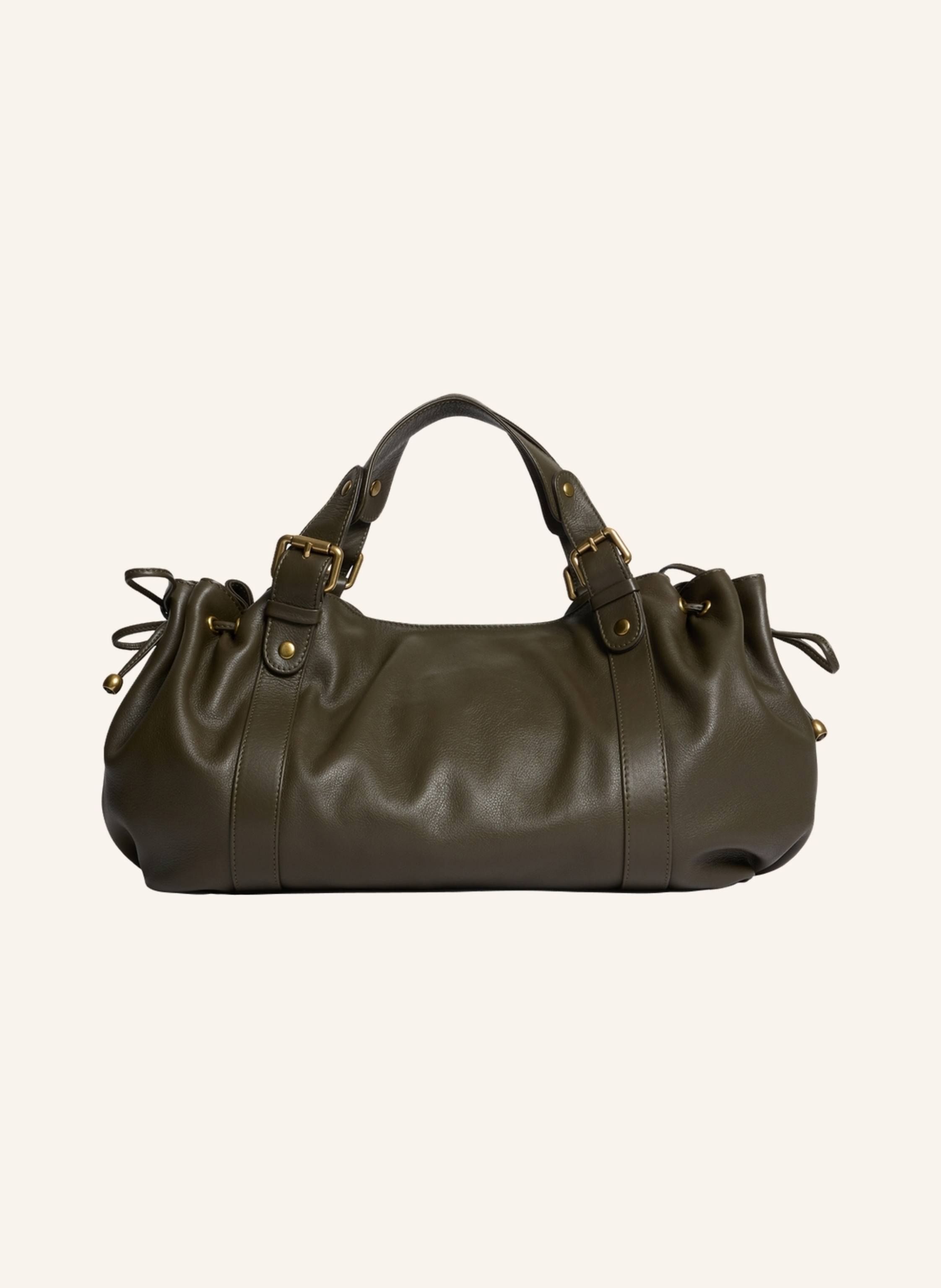 Gerard Darel 24 H ist eine ikonische Handtasche aus dem Lederwarenangebot von Darel ? zeitlos und lässig zugleich. Kombination aus einem geschmeidigen, leicht wachsartigen Gefühl und subtilen, transparenten Abschl in khaki