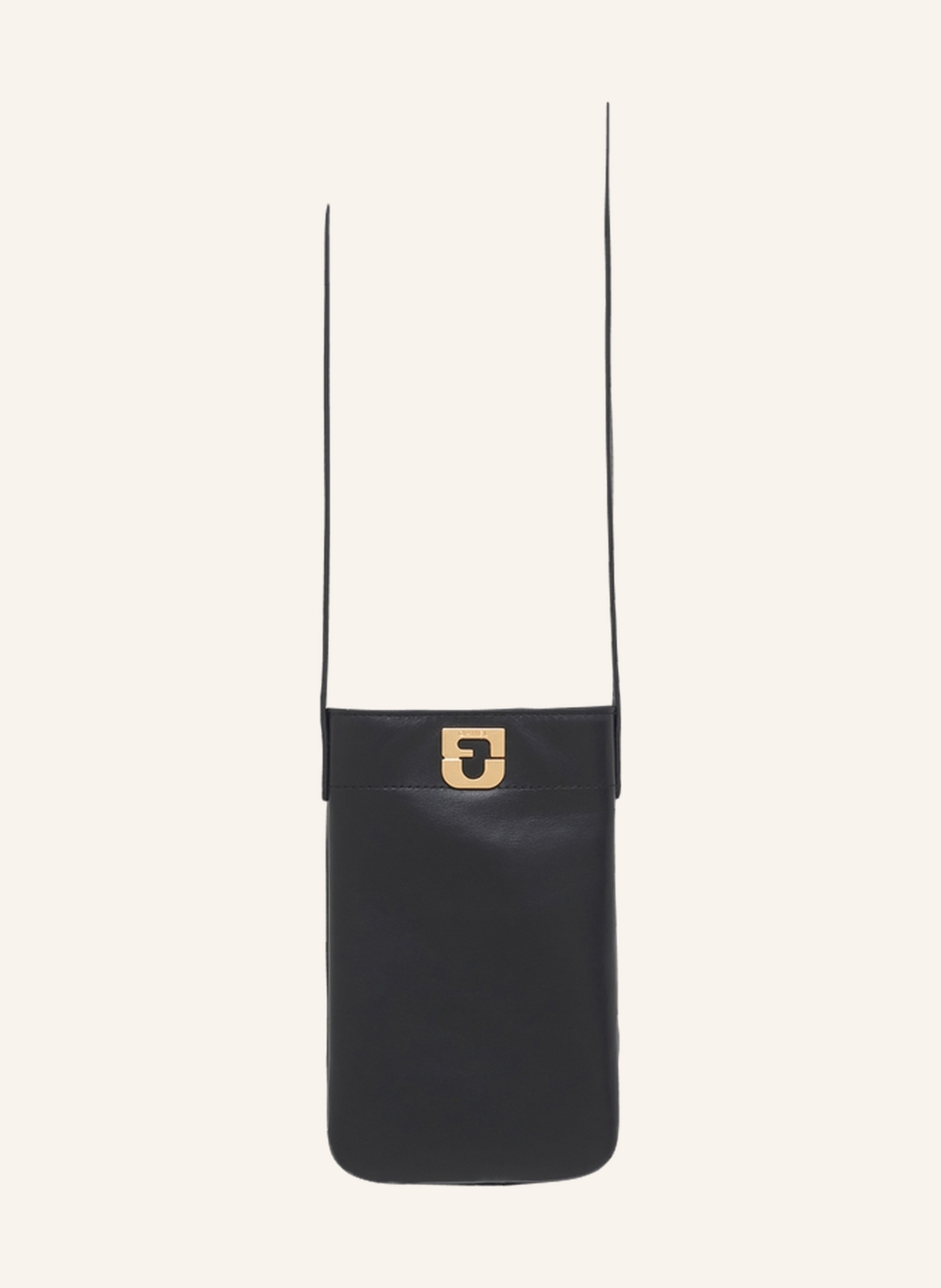 Gerard Darel Abwandlung unserer ikonischen Tasche LADY als Handytasche. Das neue trendige Accessoire, das in jeder Situation nah am Körper getragen werden kann. Aus Rindsleder, wird es diskret durch einen magnetis in schwarz