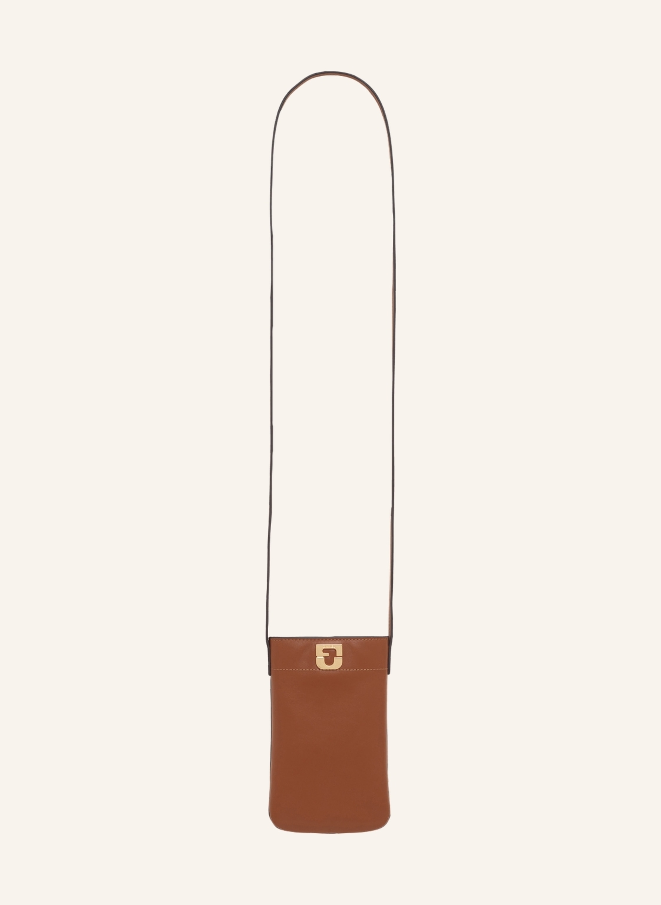 Gerard Darel Abwandlung unserer ikonischen Tasche LADY als Handytasche. Das neue trendige Accessoire, das in jeder Situation nah am Körper getragen werden kann. Aus Rindsleder, wird es diskret durch einen magnetis in cognac
