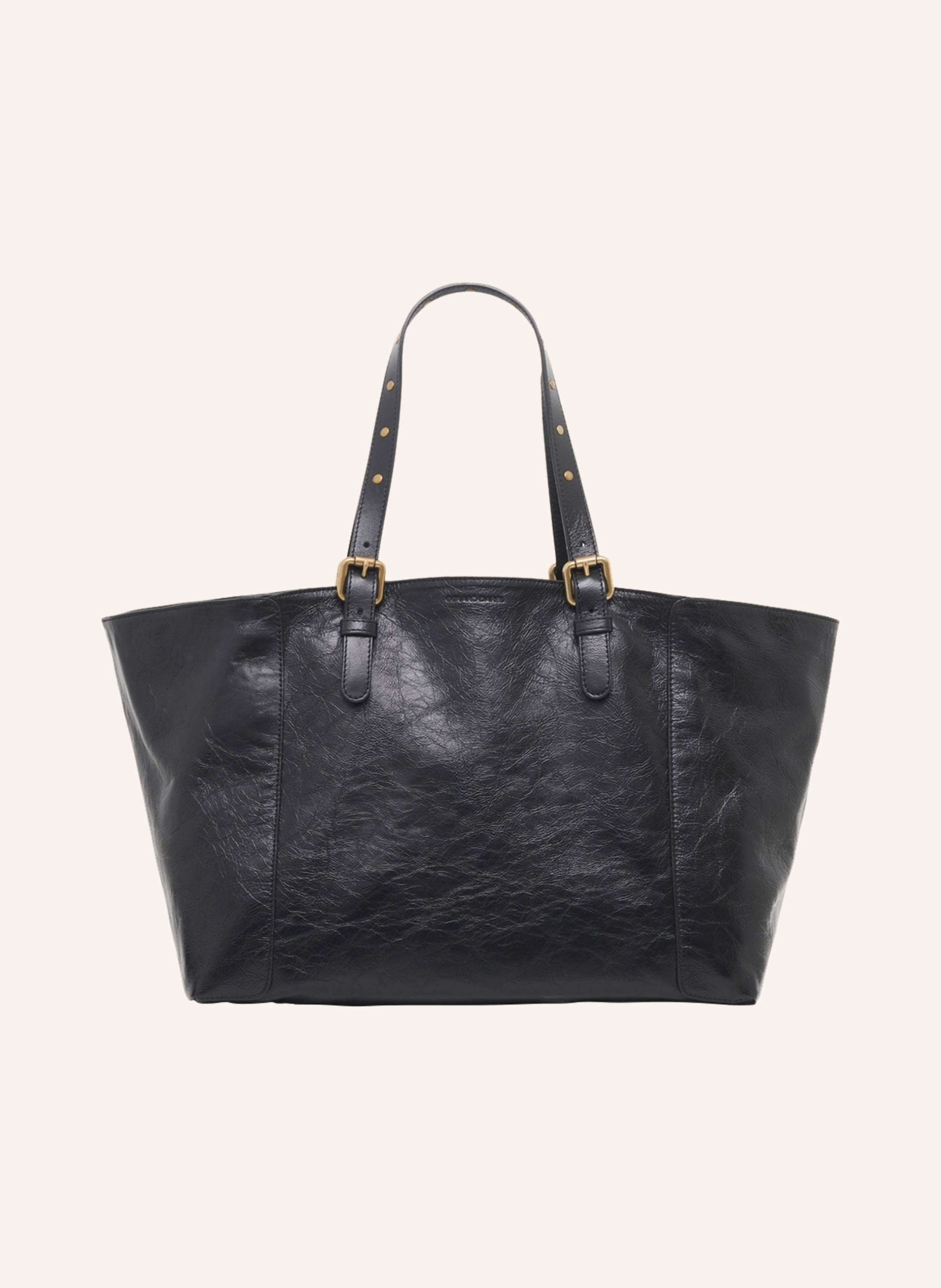 Gerard Darel Die Simple Bag ist die Tragetasche für all Ihre Destinationen. Dieses Modell mit klaren Linien wird von zwei verstellbaren Ledergriffen getragen, die mit Nieten betont sind. Ein essentielles Modell, d in schwarz