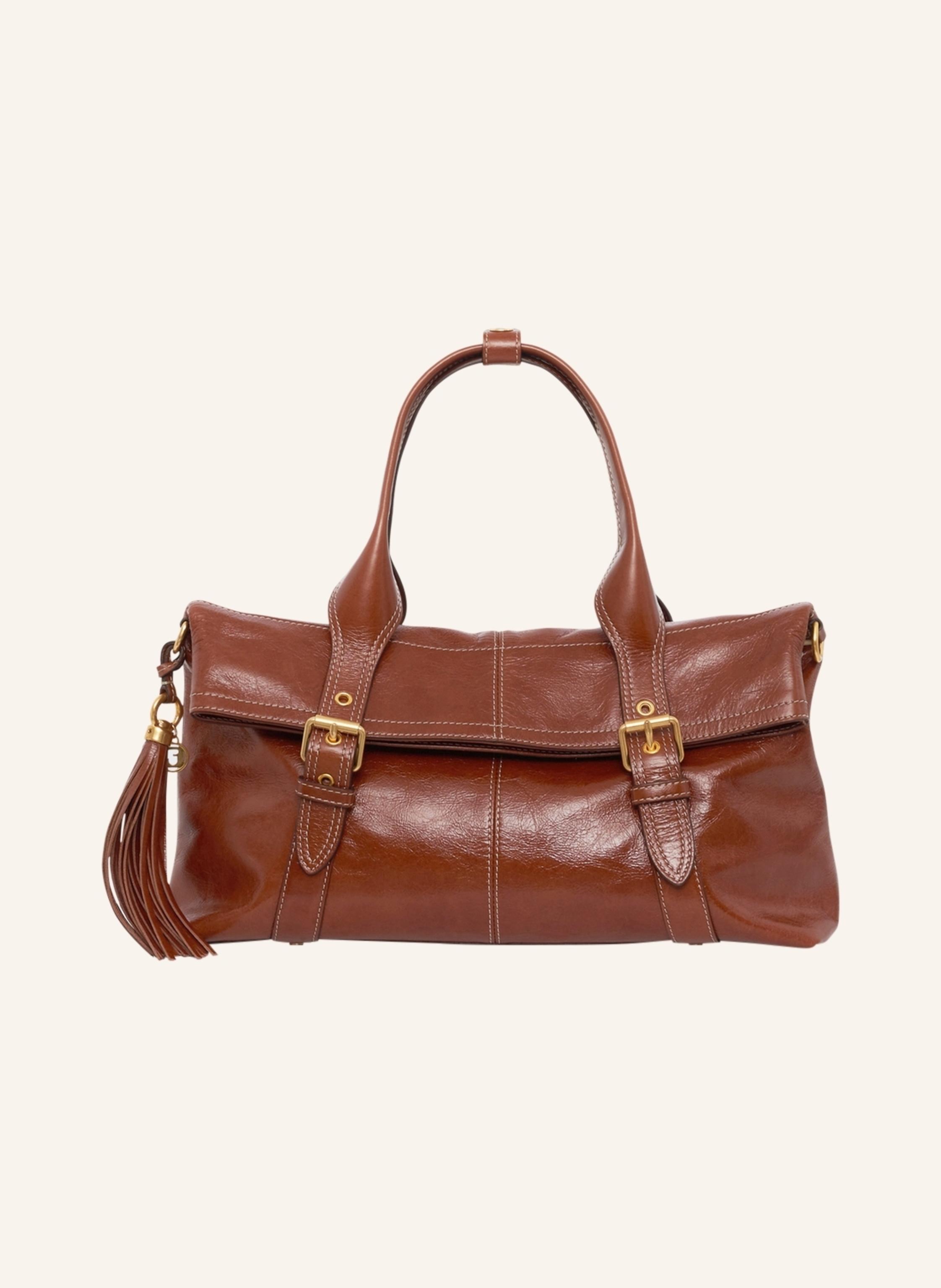 Gerard Darel Die Monica, eine schicke Hommage an den Working-Girl-Look der 90er Jahre, ist in knitterigem und glänzendem Leder erhältlich. Sie ist strukturiert und elegant, mit einer zarten Quaste versehen und läs in braun