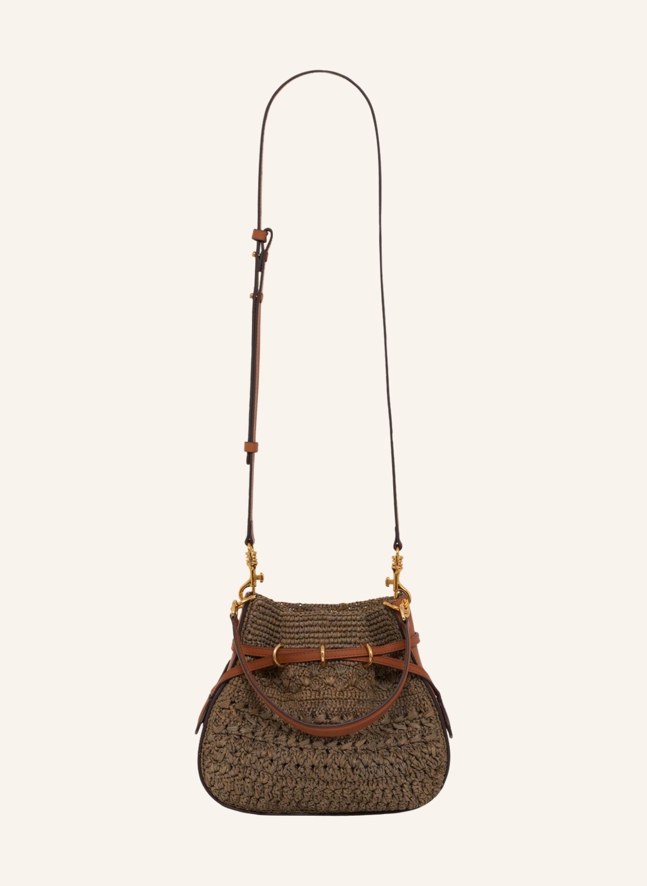Gerard Darel Der MINI ROMY, eine kuehne Neuinterpretation des bereits ikonischen Bucket Bags im Miniformat, verbindet auf subtile Weise Moderne und Tradition. Seine innovative Struktur mit einer originellen Montag Mini in khaki