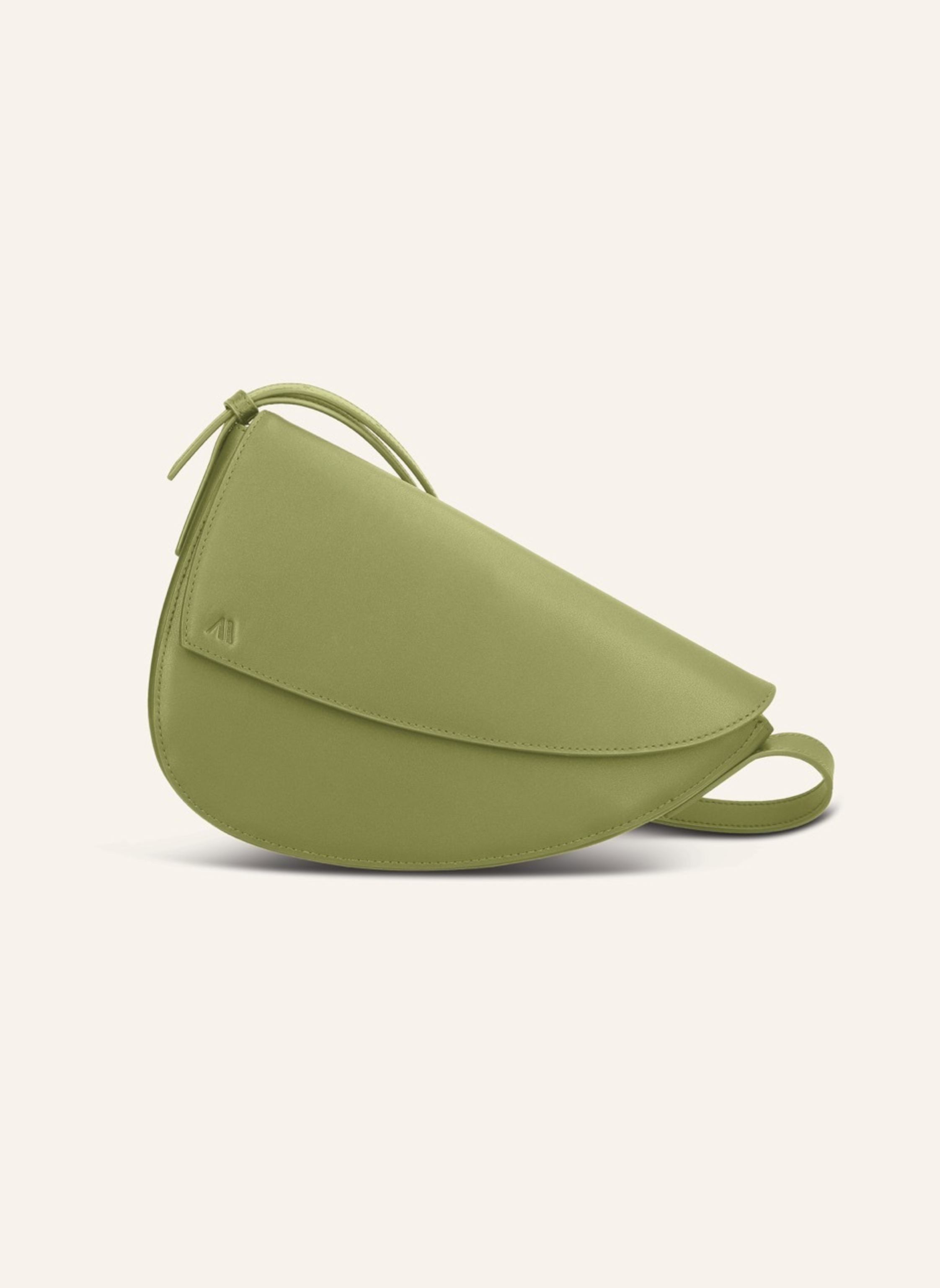Kaai Das kühne Design der Rebel Umhängetasche, bringt Ihre Individualität und stilvollen Look zum Ausdruck. Mit ihrer auffälligen asymmetrischen Silhouette ist die Rebel eine Statement-Tasche für Frauen, d in grün