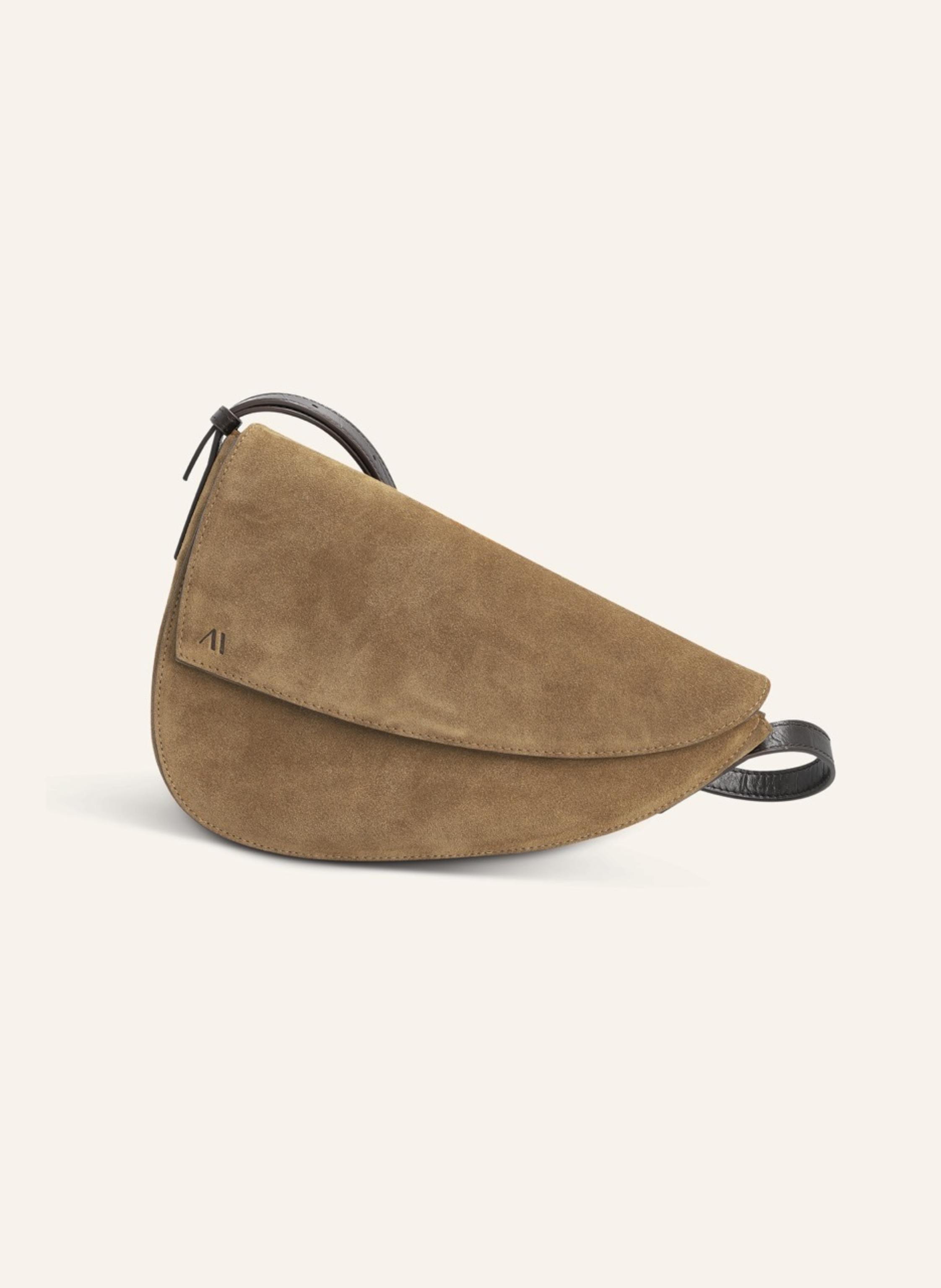Kaai Das kühne Design der Rebel Umhängetasche, bringt Ihre Individualität und stilvollen Look zum Ausdruck. Mit ihrer auffälligen asymmetrischen Silhouette ist die Rebel eine Statement-Tasche für Frauen, d in ecru