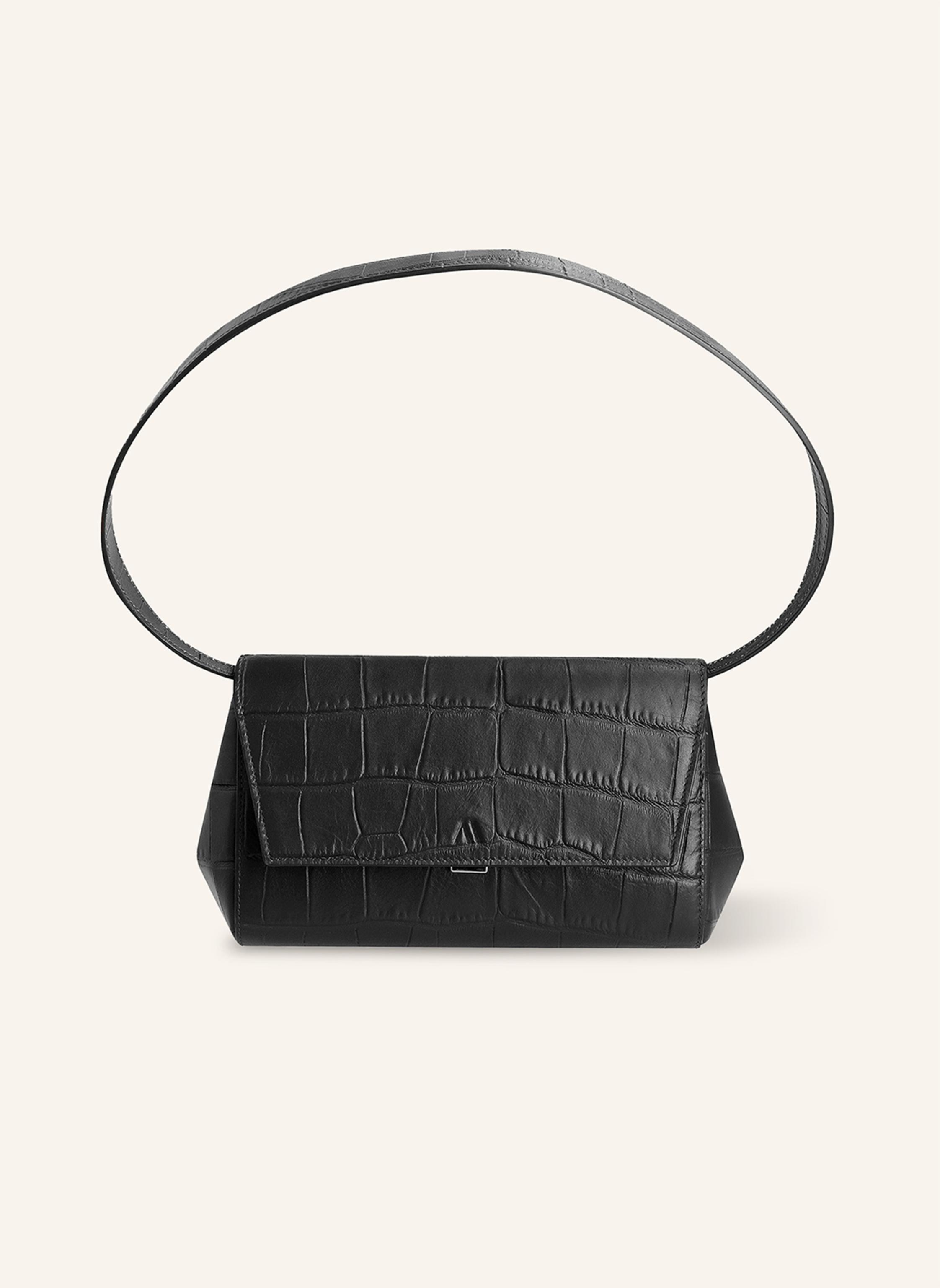 Kaai Die feminine, stilvolle IKON Clutch ist in einer Reihe von klassischen und trendigen Farben verfügbar, die jedes Outfit ergänzen, wenn Sie von einem Ort zum anderen gehen. Die auffällige und modische in schwarz