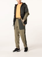 UNDER ARMOUR Training pants UA RUSH™, Color: OLIVE/ DARK GREEN (Image 1)