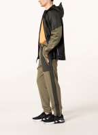 UNDER ARMOUR Training pants UA RUSH™, Color: OLIVE/ DARK GREEN (Image 1)