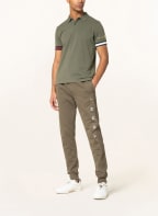 TOMMY HILFIGER Piqué-Poloshirt Slim Fit, Farbe: OLIV (Bild 1)