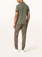 TOMMY HILFIGER Piqué-Poloshirt Slim Fit, Farbe: OLIV (Bild 1)