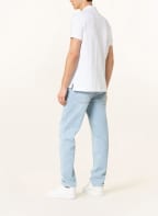 TOMMY HILFIGER Piqué-Poloshirt Regular Fit, Farbe: WEISS (Bild 1)