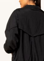 Nike Oversized-Trainingsjacke SPORTSWEAR ESSENTIAL WINDRUNNER, Farbe: SCHWARZ (Bild 1)