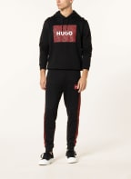 HUGO Sweatpants DACINO mit Galonstreifen, Farbe: SCHWARZ/ ROT (Bild 1)