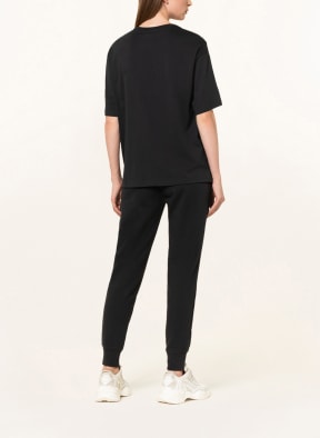 new balance Oversized shirt ESSENTIALS STACKED, Color: BLACK (Image 1)