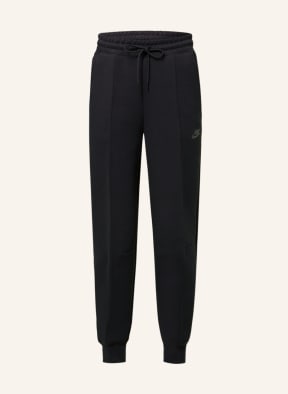 Black and gold nike sweatpants deals