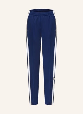 Blue and white adidas pants discount