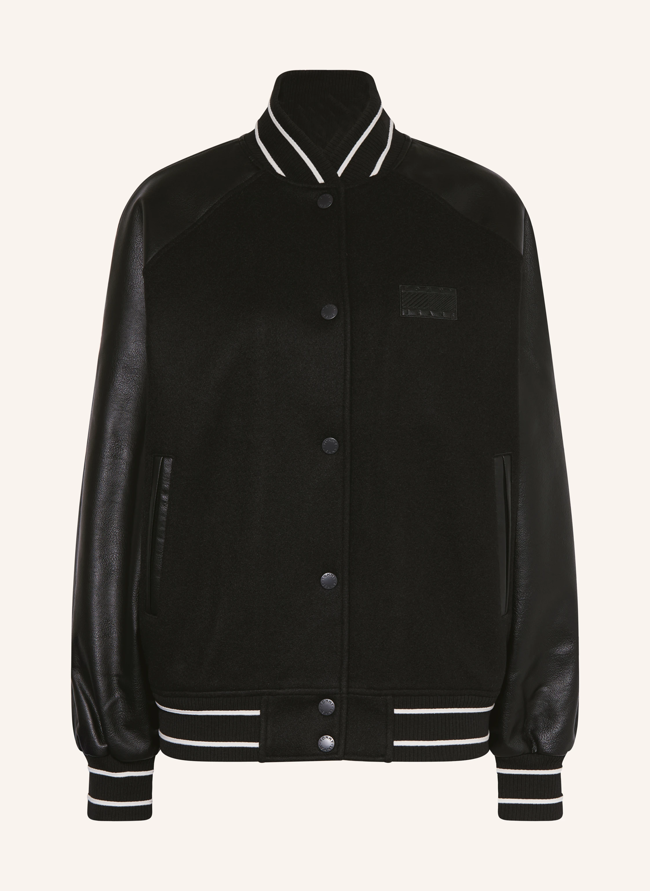 TOMMY JEANS Collegejacka i materialmix: SVART