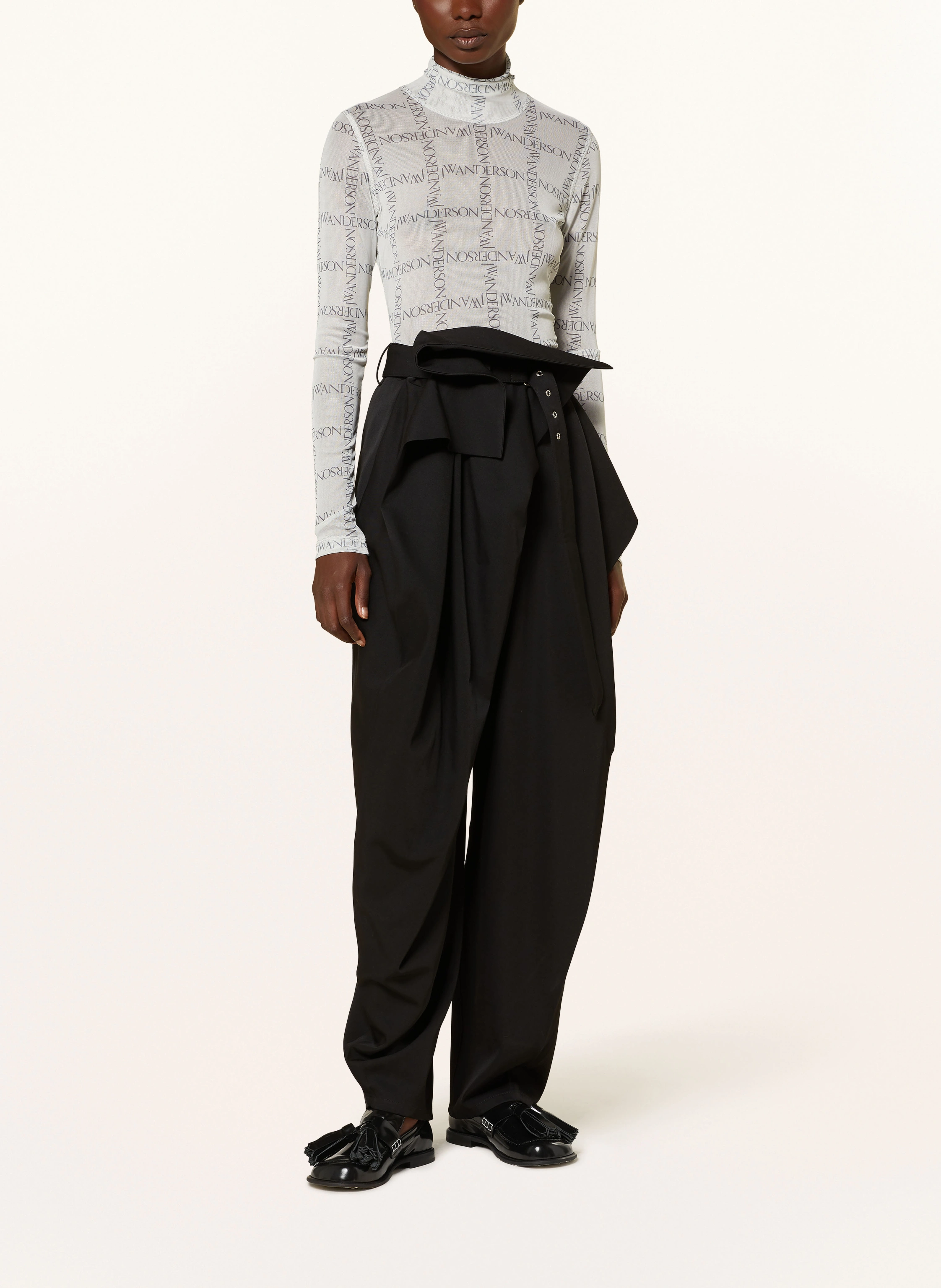 JW ANDERSON Trousers in black