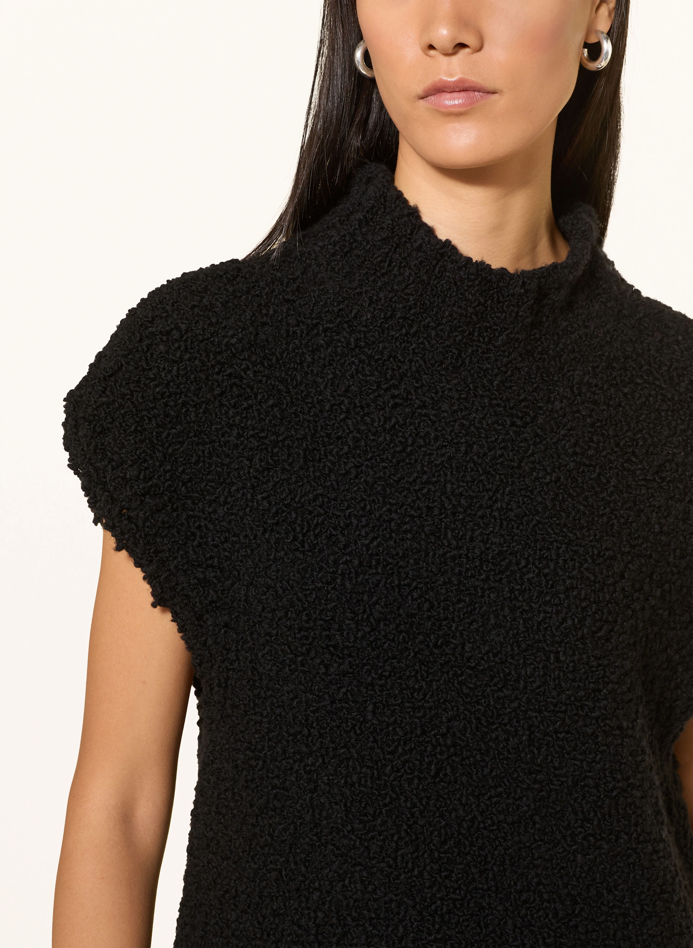 Grace Pull sans manches en fourrure synthétique en noir