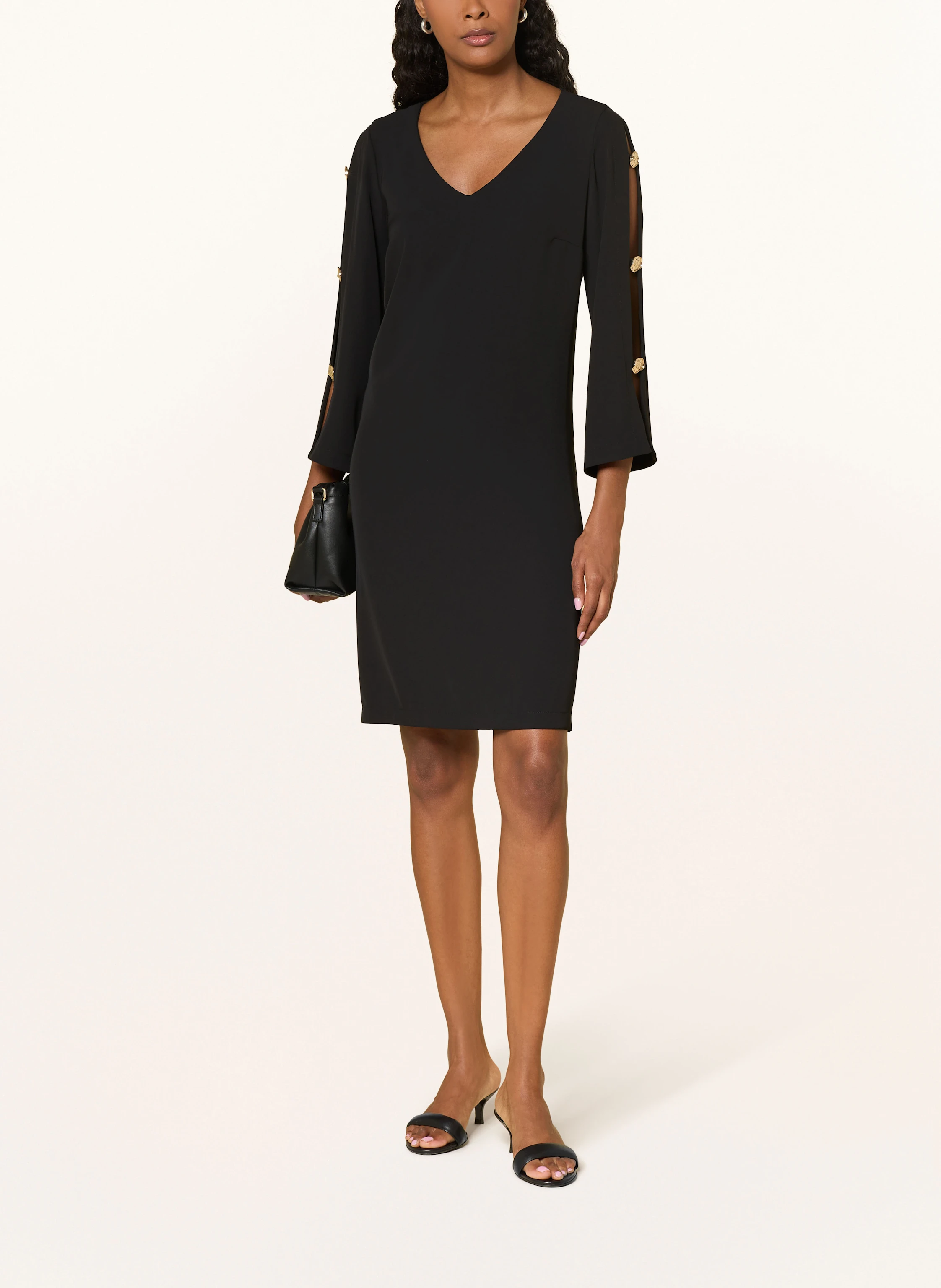Joseph Ribkoff Dress with cut-outs and 3/4 sleeves in black Joseph Ribkoff Dress with cut-outs and 3/4 sleeves in black
