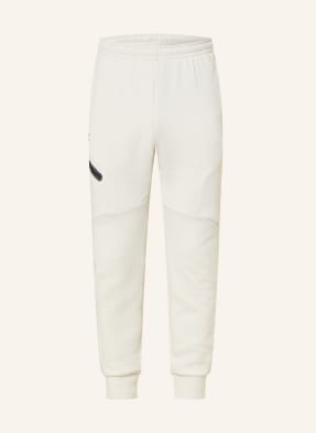 Under Armour Tepláky Ua Unstoppable krémová