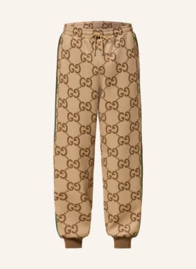 GUCCI Pants in jogger style with tuxedo stripes