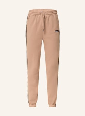 ellesse Trousers DELFINIA in jogger style with tuxedo stripe