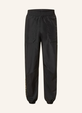 VERSACE Track pants with tuxedo stripes