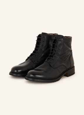 Cordwainer Lace-up boots with real fur
