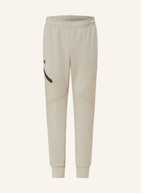 UNDER ARMOUR Trousers UNSTOPPABLE in jogger style