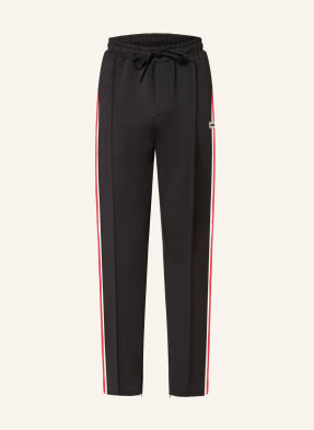 WRSTBHVR Track pants TREV with tuxedo stripes