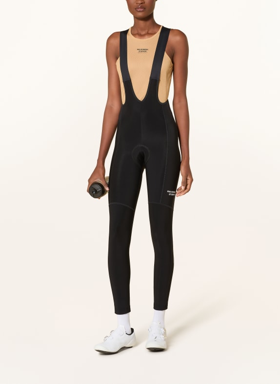 PAS NORMAL STUDIOS Thermische fietsbroek ESSENTIAL THERMAL LONG met bretels en gewatteerde inzetstukken ZWART