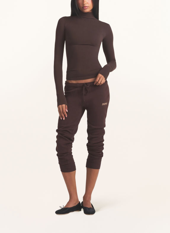 SKIMS Pohodlné domácí legíny COTTON FLEECE ESPRESSO