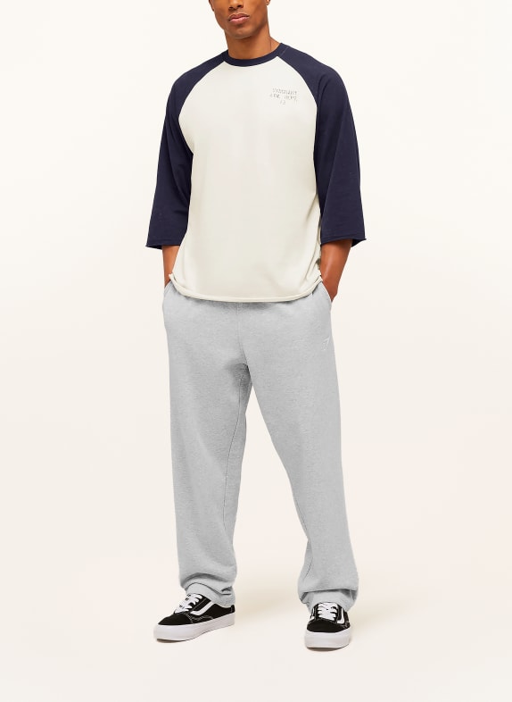GYMSHARK Oversize-Shirt RETRO COLLEGIATE mit 3/4-Arm CREME / DUNKELBLAU