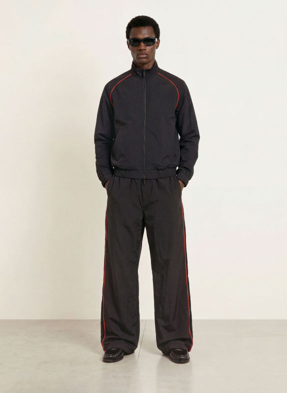 WRSTBHVR Trainingsbroek JALE met galonstrepen ZWART / ROOD