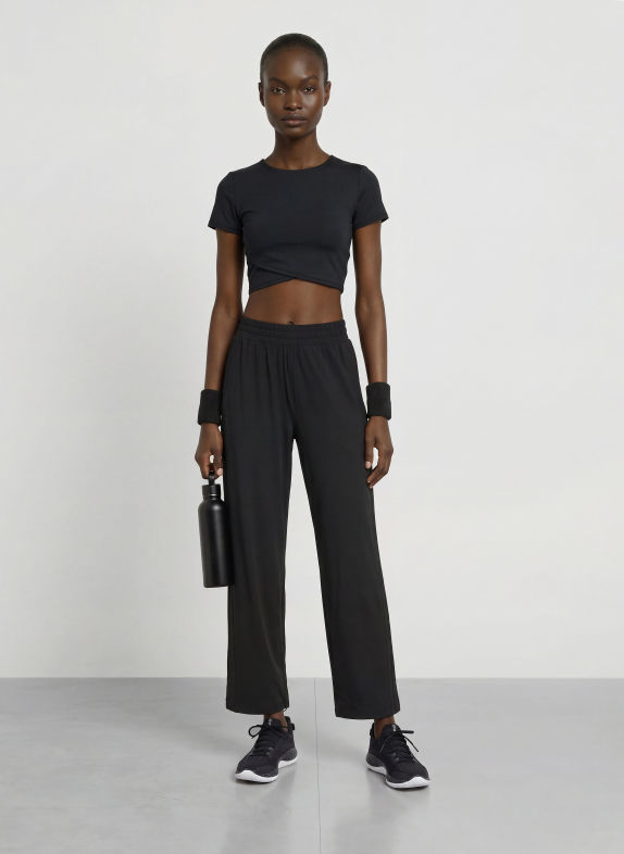 Sweaty Betty Kort funktionstrøje ALL DAY med viklingslook SORT