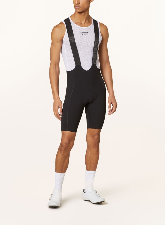 PAS NORMAL STUDIOS Fietsbroek ESSENTIAL LIGHT met bandjes en gewatteerde inzetstuk ZWART