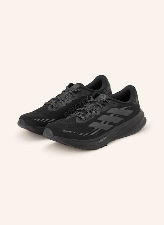 adidas STEP adidas STEP pureboost go legend ivy core black true orange GTX M SCHWARZ