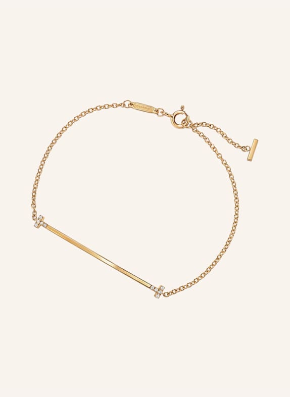 TIFFANY & Co. Bransoletka TIFFANY T z 18-karatowego żółtego złota z brylantami ZŁOTY