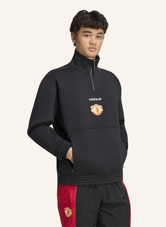 adidas MANCHESTER UNITED EQT OBERTEIL, REISSVERSCHLUSS BIS ZUR BRUST SCHWARZ