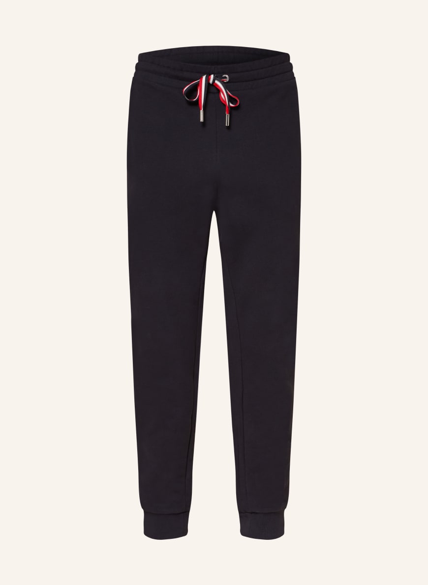 Black sweatpants with top red stripe