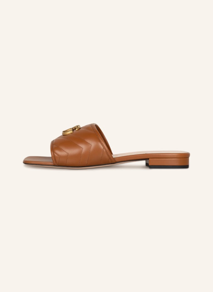 Leather hot sale gucci slides