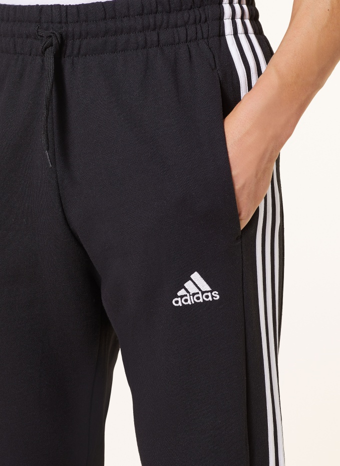 Adidas black hotsell and white sweatpants