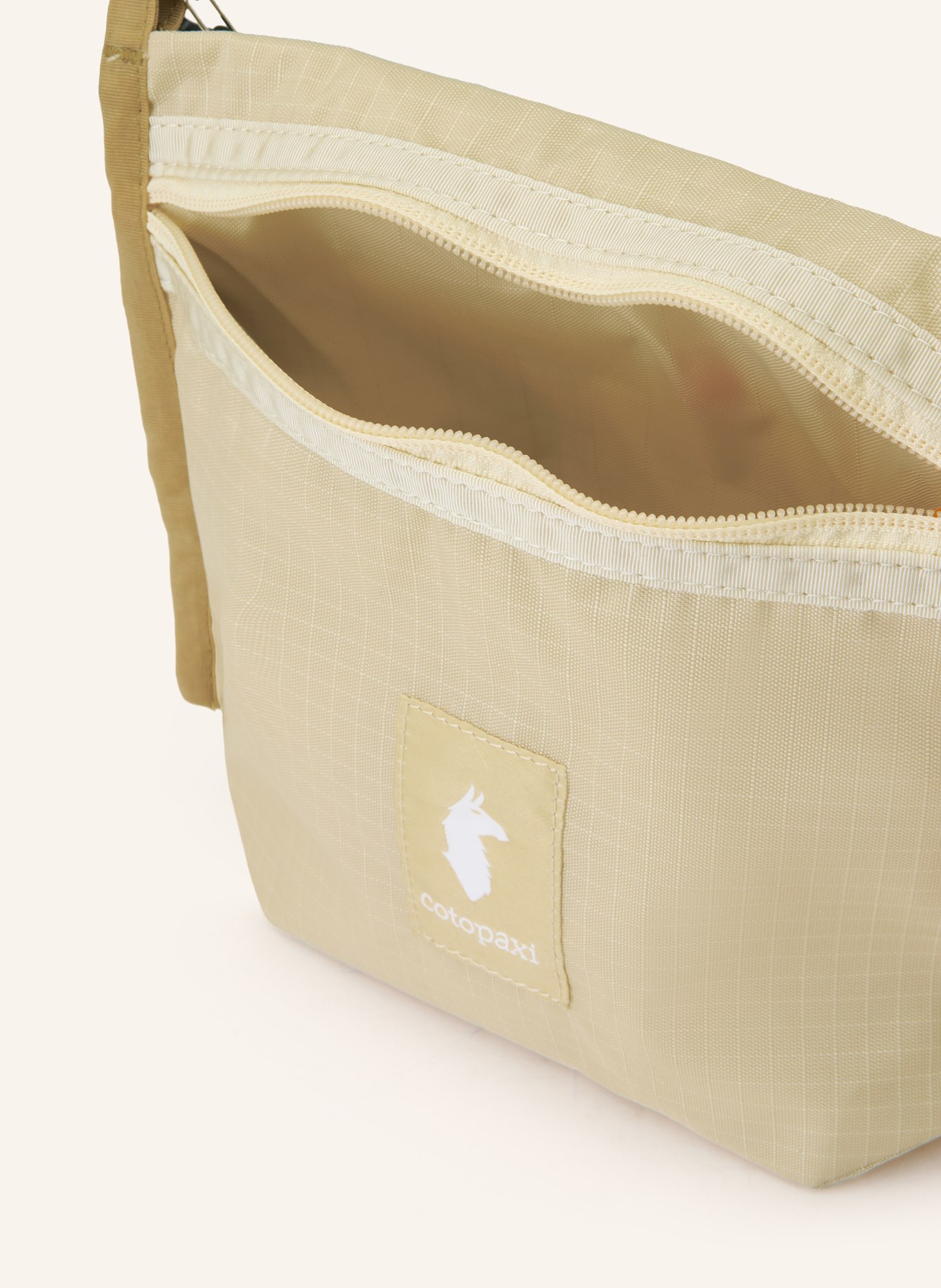 cotopaxi Kabelka přes rameno LISTA 2 L: BÉŽOVÁ